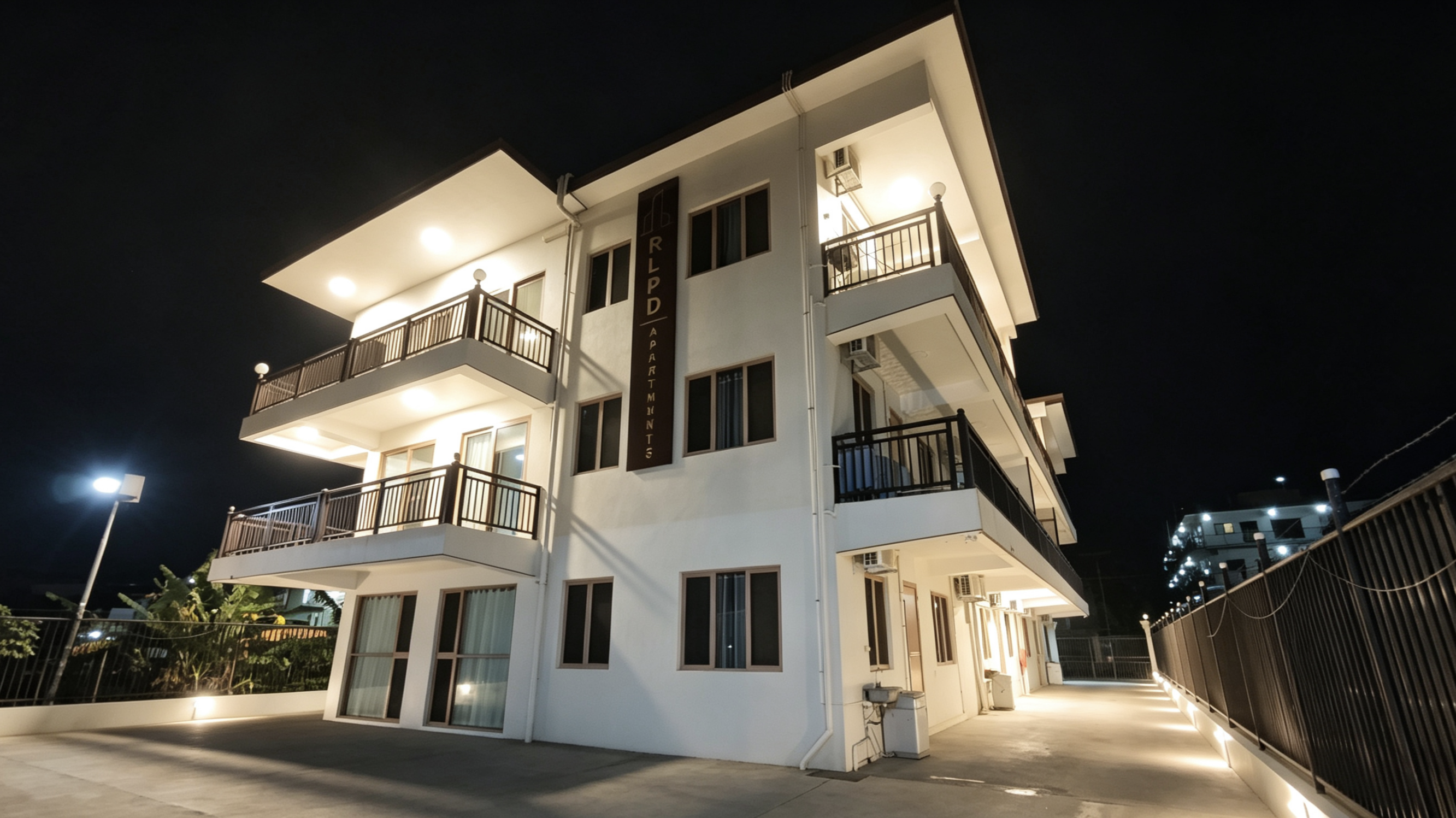 Exterior at night - Alice Apartments